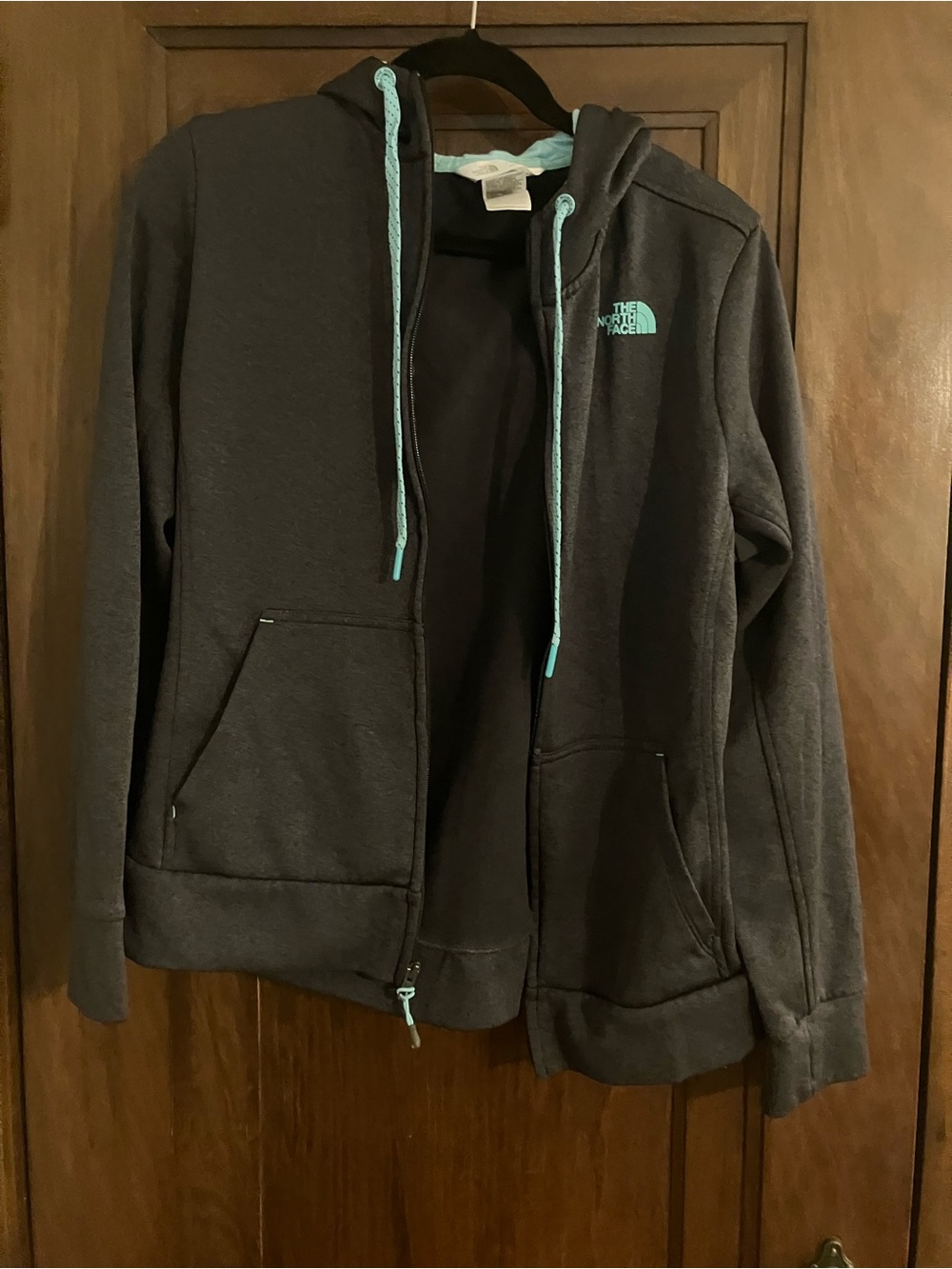 The North Face Women's Black Hoodie with Teal Accents